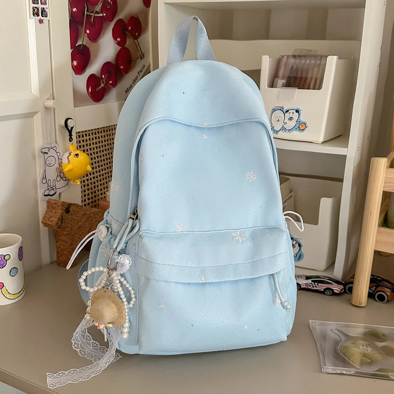 Lustiger Schulrucksack mit Themen-Verzierungen
