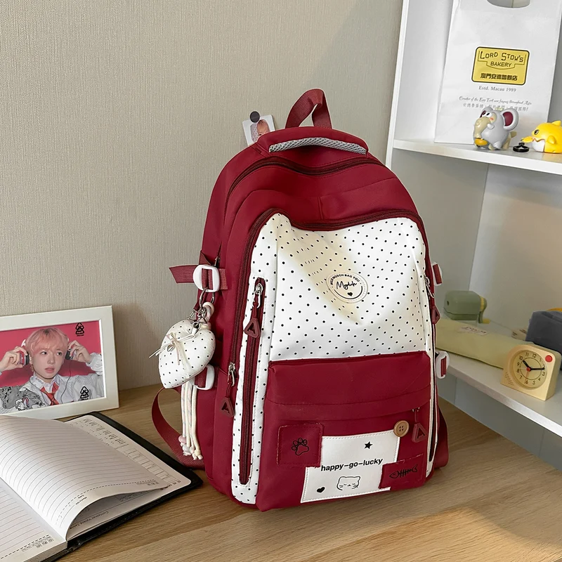 Niedlicher Schulrucksack mit Tupfenmuster