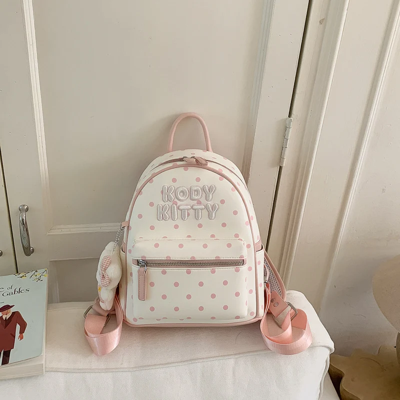 Niedlicher gepunkteter Schulrucksack mit Charakter-Motiv