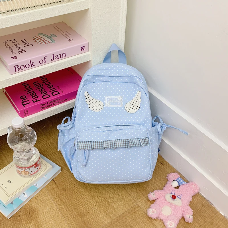 Schultasche mit Polka Dots und Charakterdesign