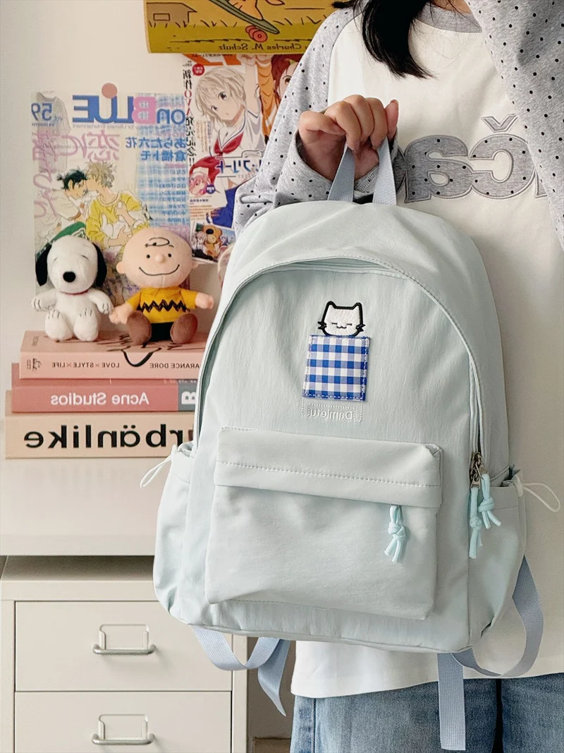 Kompakter Schulrucksack mit Katzenstickerei
