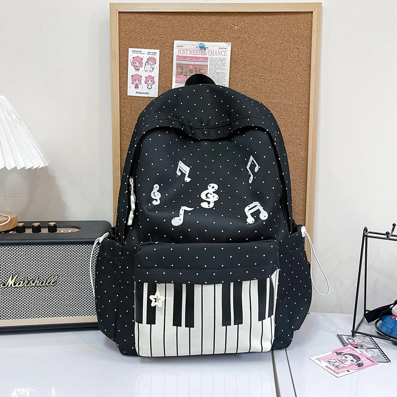 Schulrucksack mit Laptopfach und Musikmotiv