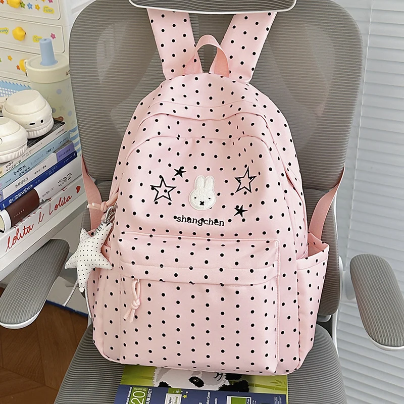 Niedlicher gemusterter Schulrucksack