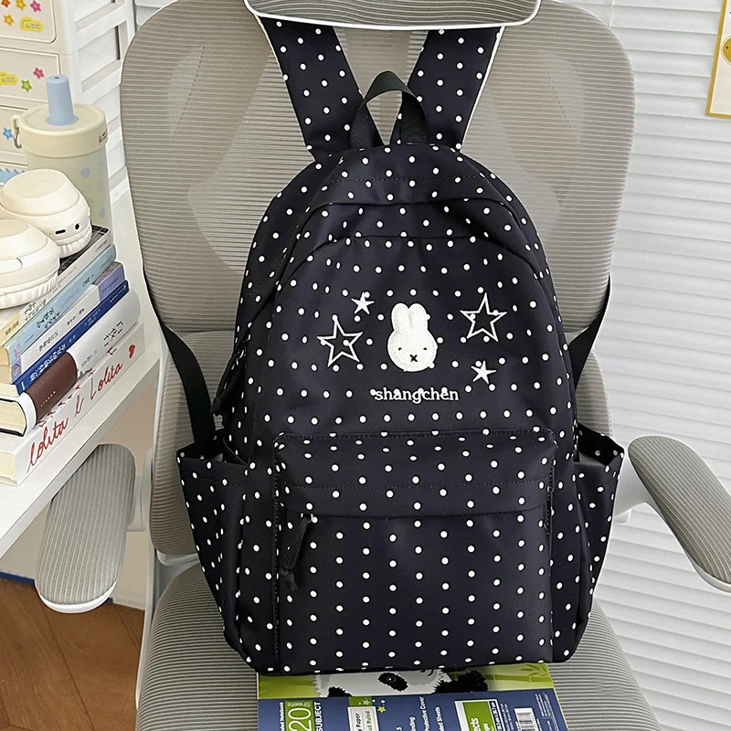 Niedlicher gemusterter Schulrucksack