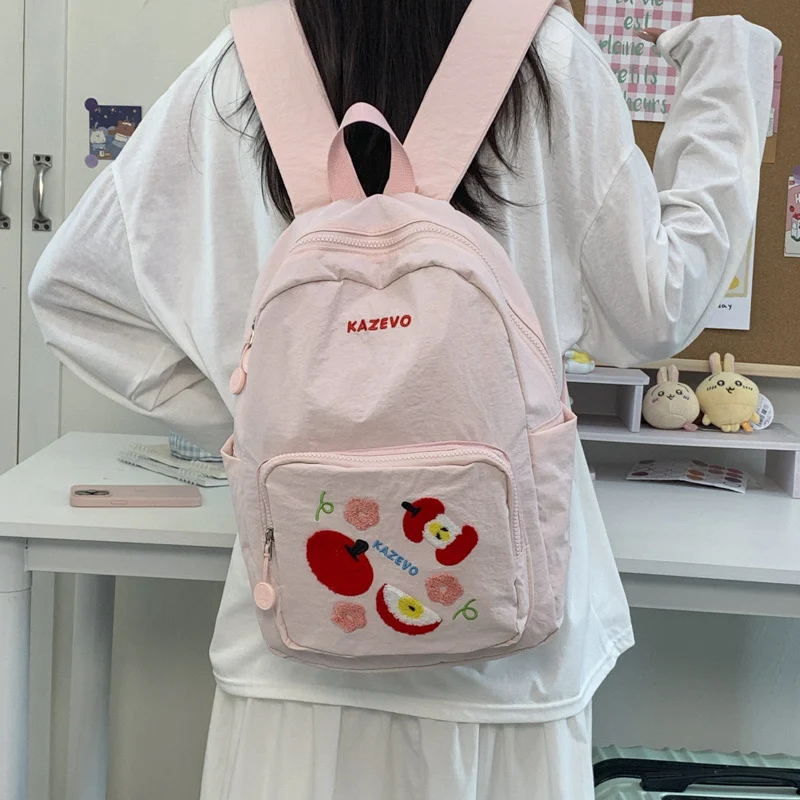Bestickter Schulrucksack mit Fruchtmotiv