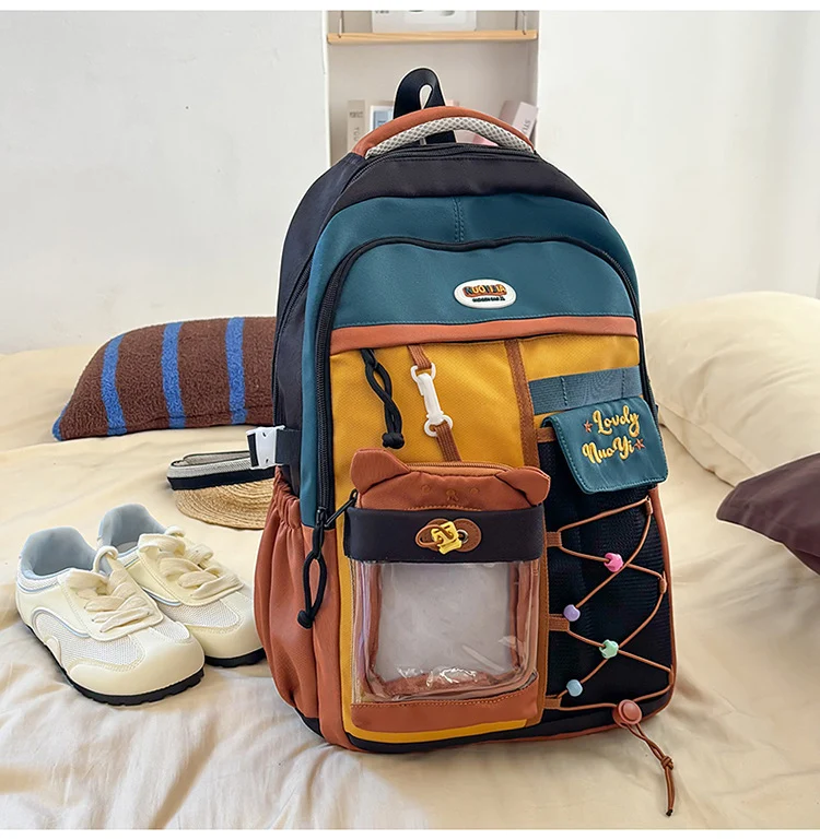 Schulrucksack mit Farbblock-Design und mehreren Taschen