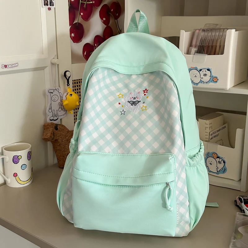 Lustiger gemusterter Schulrucksack