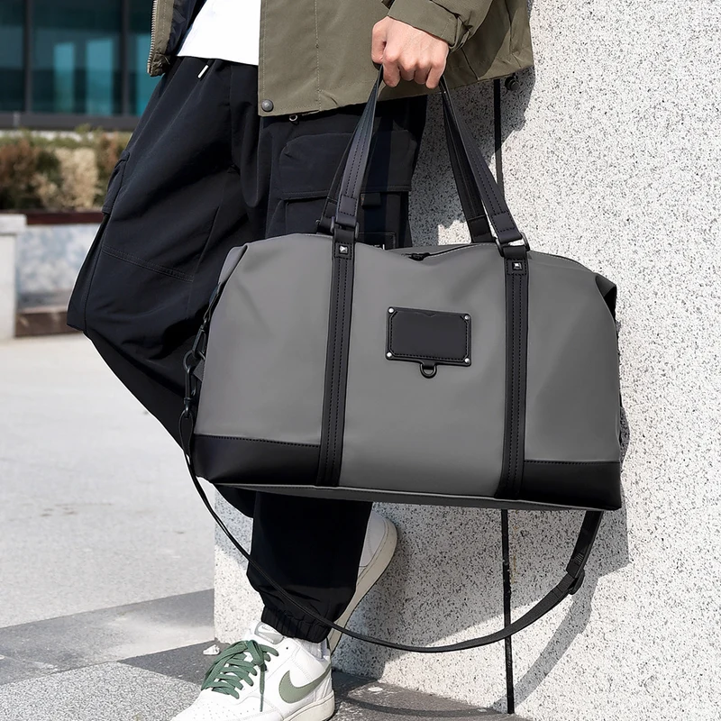 Sportliche Reisetasche mit stilvollem Design und robusten Griffen Skanto