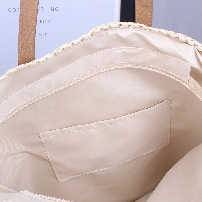 Handgewebte Strandtasche aus Naturmaterial mit Lederdetails Skanto