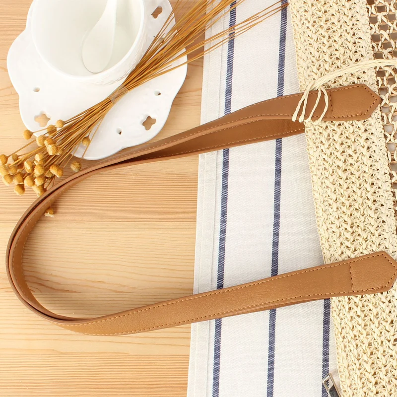 Handtasche aus natürlichem Webmaterial mit eleganten Lederriemen Skanto