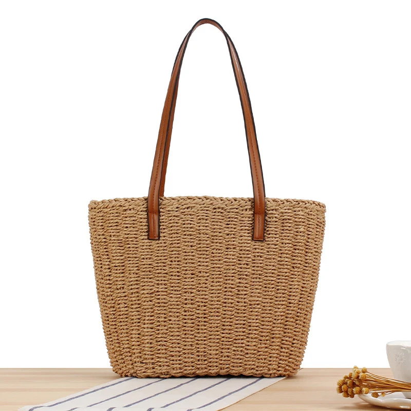 Handtasche aus Naturgeflecht mit Ledergriffen Skanto