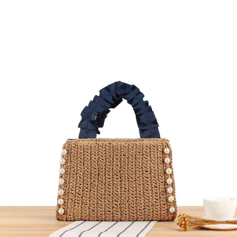 Elegante Handtasche mit Perlenverzierung und gerafftem Griff Skanto