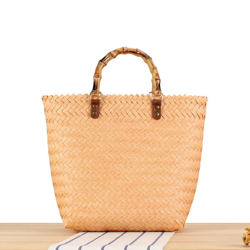 Handtasche aus hochwertigem, geflochtenem Material mit Bambusgriff Skanto