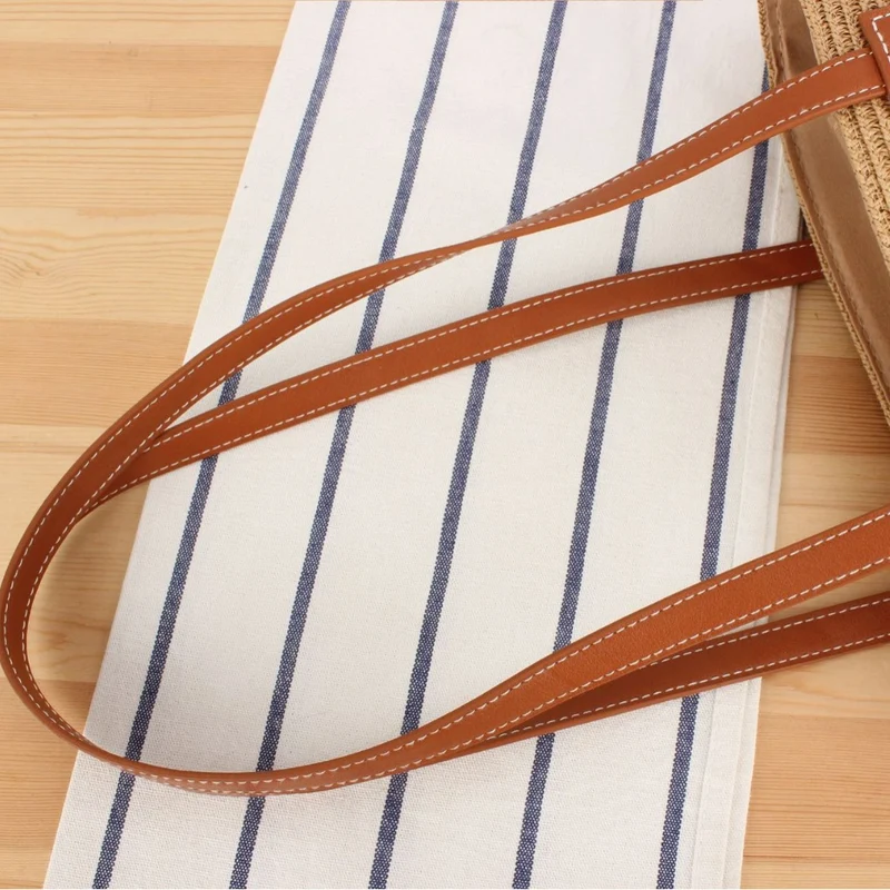 Handtasche aus hochwertigem Bast mit eleganten Ledergriffen Skanto