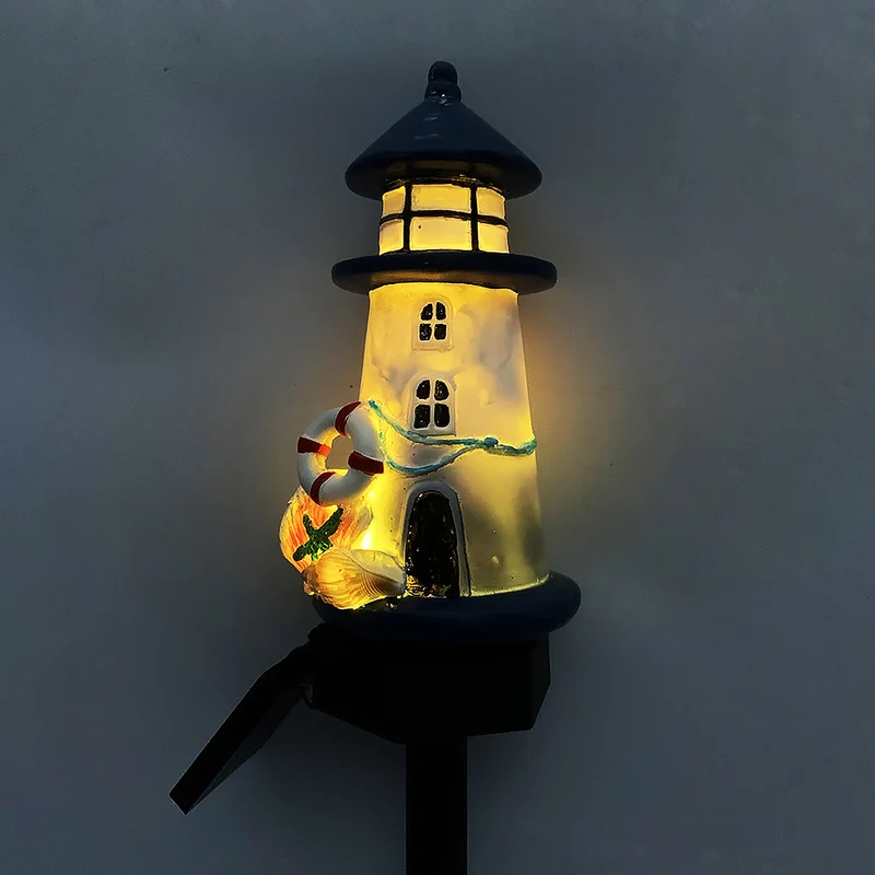 Solarbetriebene Leuchtturm-Gartenstecker-Leuchte mit warmer LED-Harz-Laterne und Dämmerungssensor Skanto