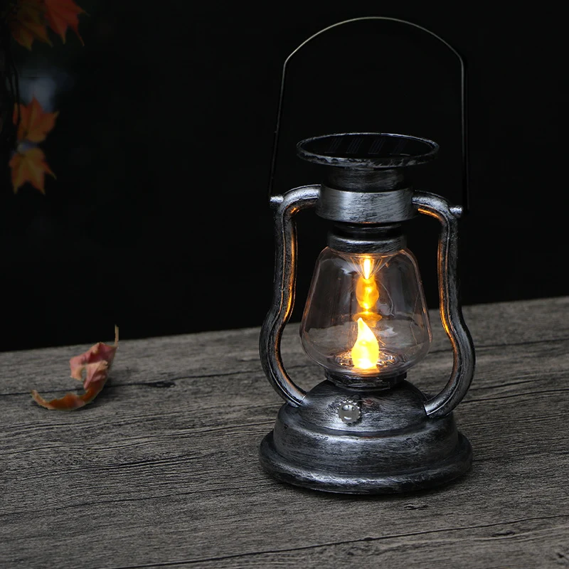 Solar-LED-Sturmlaterne im Vintage-Stil mit Glaszylinder und Metallgriff Skanto