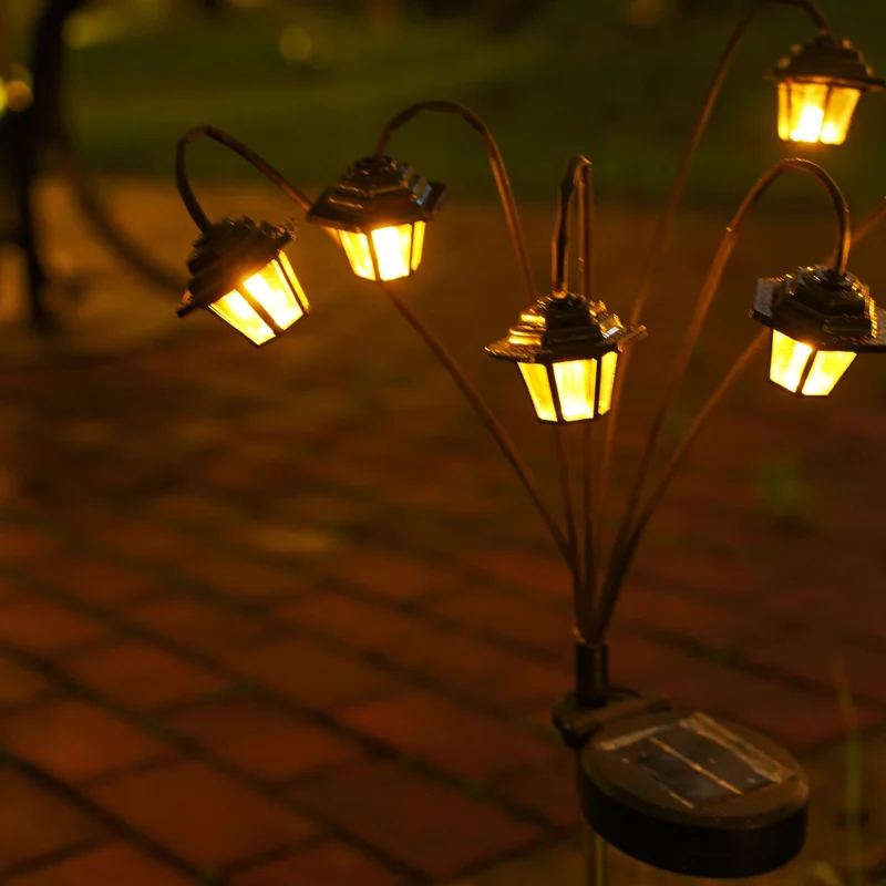 Dekorative Solar-Gartenstecker-Laternen mit mehreren Köpfen und warmem LED-Licht Skanto