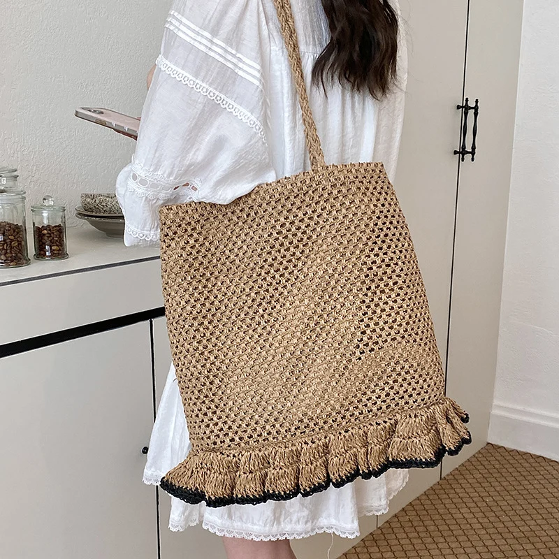 Handgefertigte Strohtasche mit Fransenrand Skanto