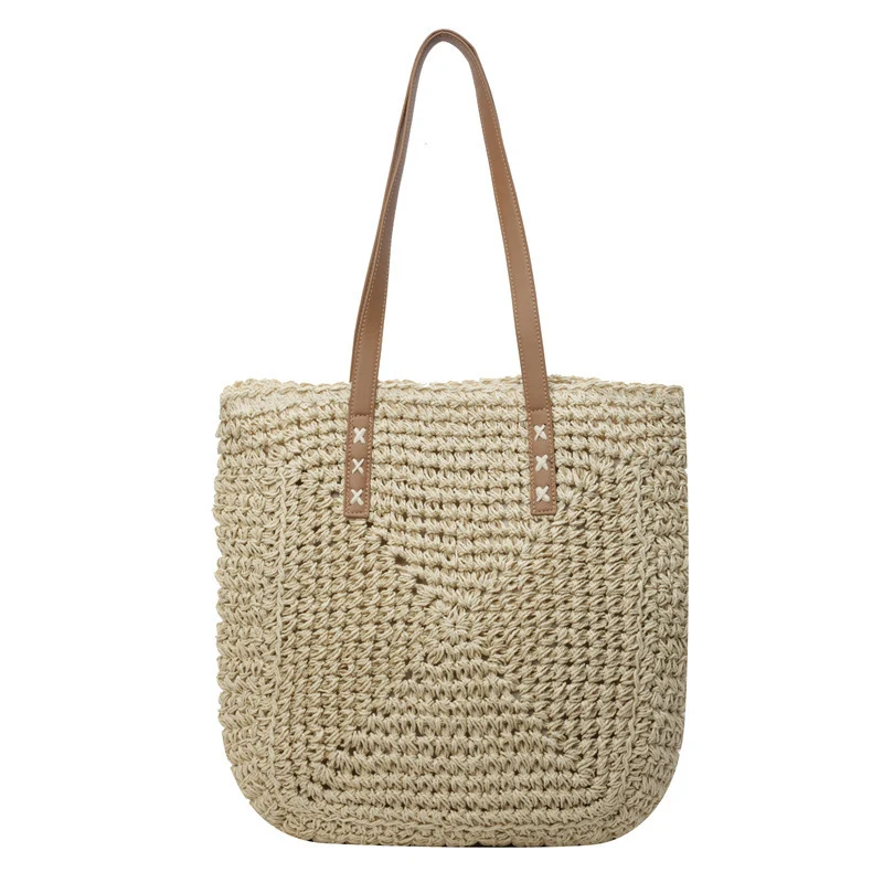 Geflochtene Strandtasche mit eleganten Lederdetails Skanto