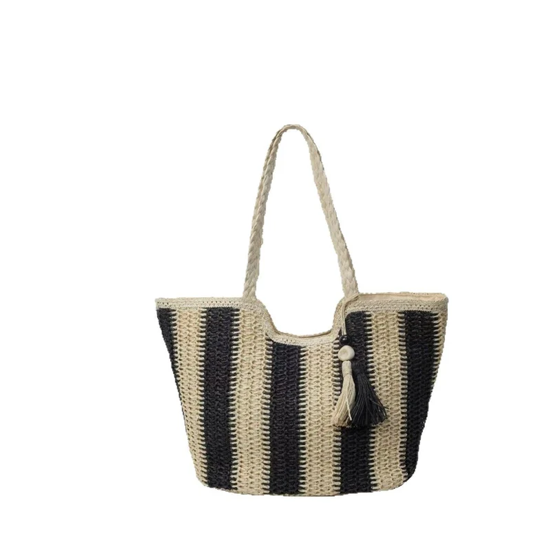 Geflochtene Strandtasche mit dekorativem Quastenanhänger Skanto