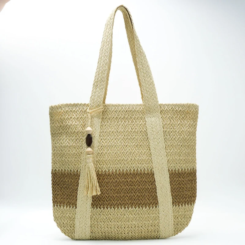 Handtasche aus natürlichem, handgewebtem Stroh mit eleganten Fransen Skanto