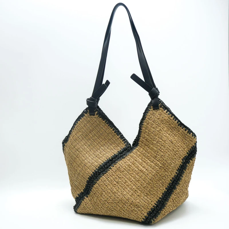 Handtasche aus geflochtenem Naturmaterial mit schwarzem Kordelzug Skanto