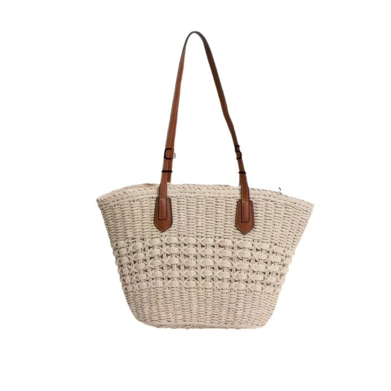 Handtasche aus geflochtenem Naturmaterial mit eleganten Ledergriffen Skanto
