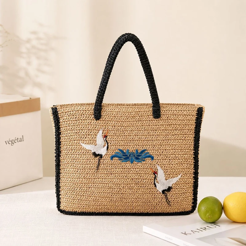 Elegante Stroh-Tote-Bag mit künstlerischem Stickdesign Skanto