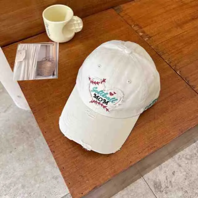 Damen Baseballkappe im Used-Look mit Herzstickerei Skanto