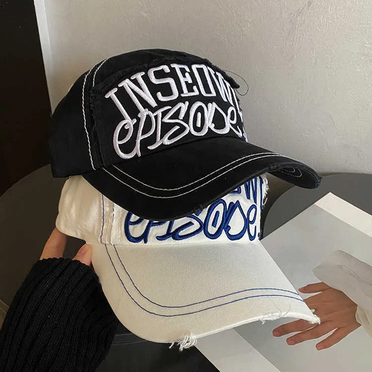 Damen bestickte Cap im Used-Look mit künstlerischem Motiv Skanto