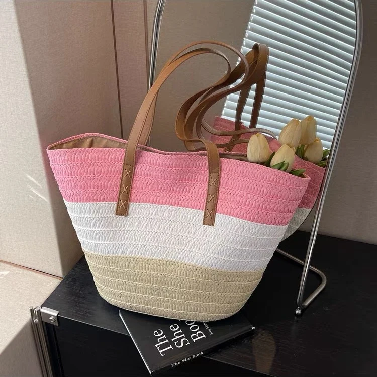 Geflochtene Strandtasche mit robusten Ledergriffen Skanto