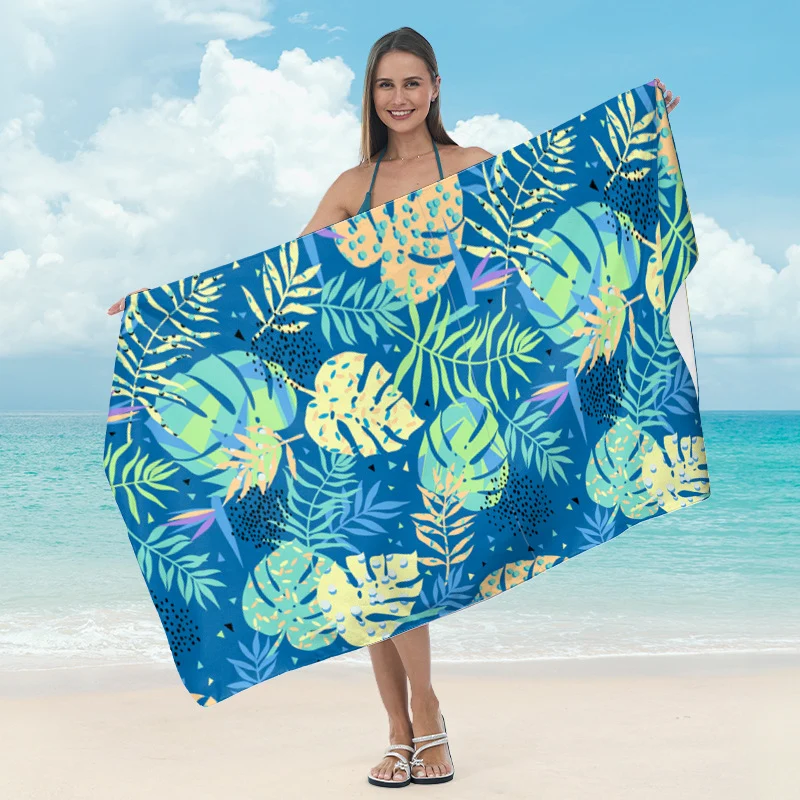 Strandtuch mit kreativen Surf-Motiven Skanto