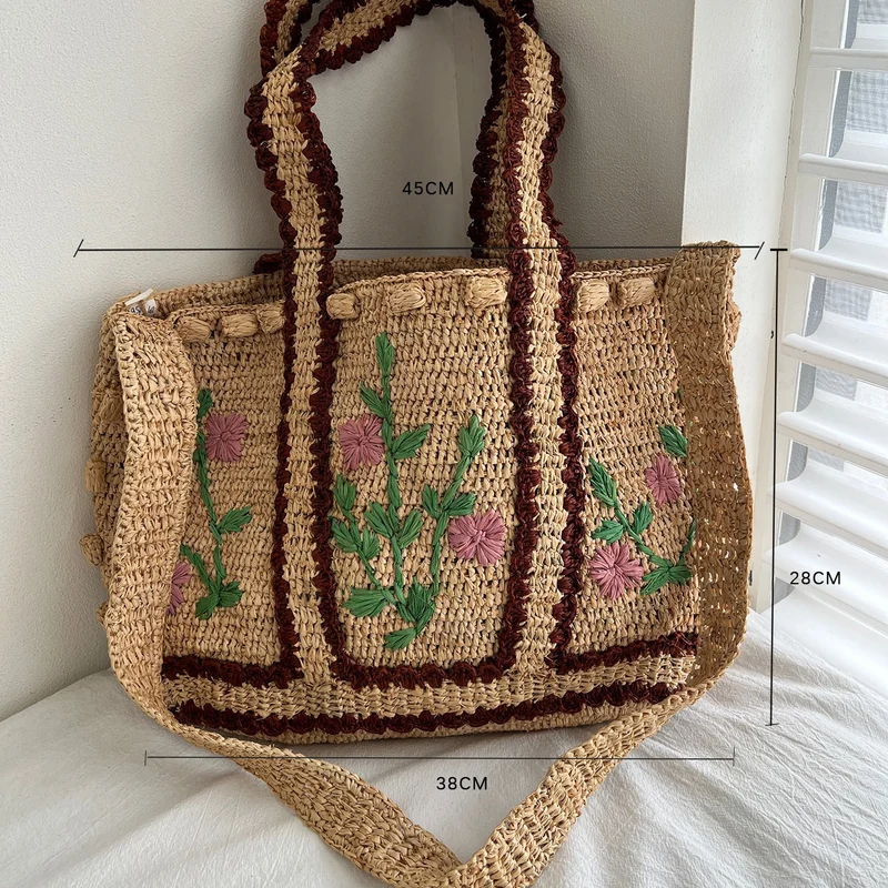 Geflochtene Umhängetasche mit Blumenmuster Skanto