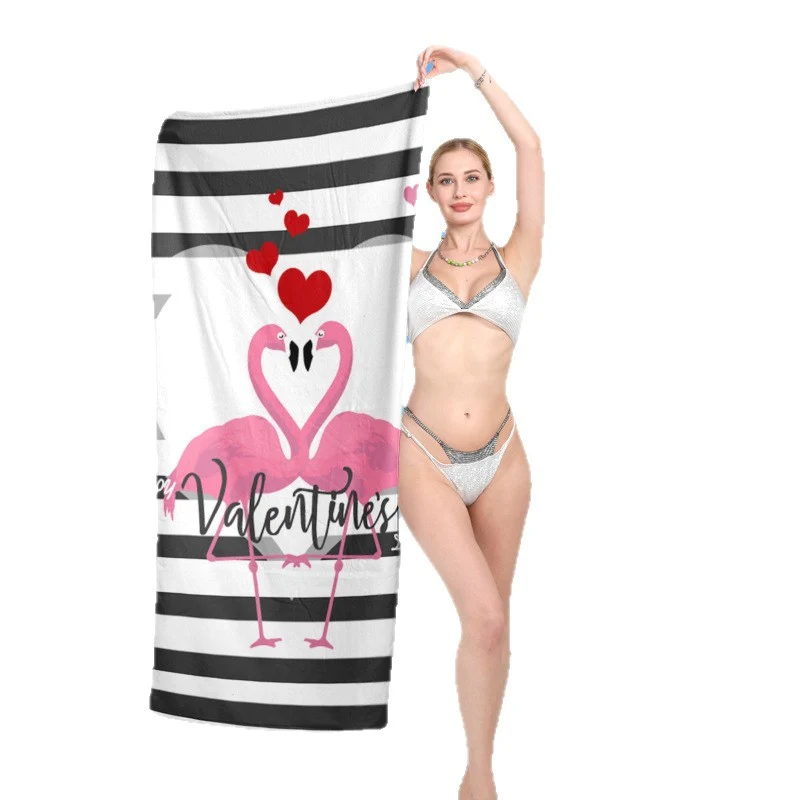 Elegantes und funktionales Strandtuch mit tropischem Flamingo-Design Skanto