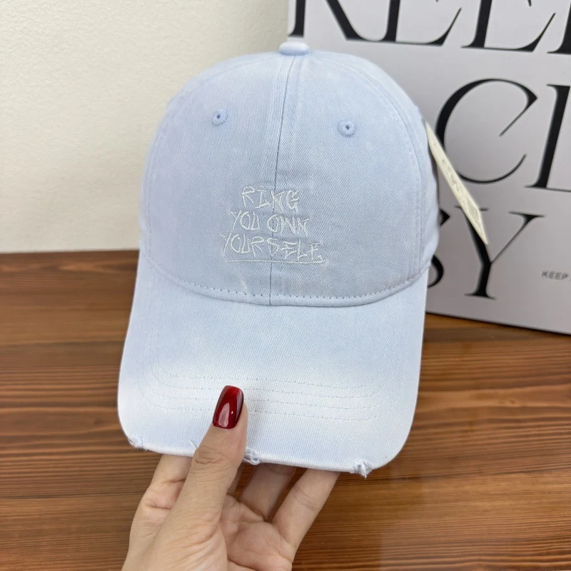 Damen Baseballkappe im Used-Look mit Motiv Skanto