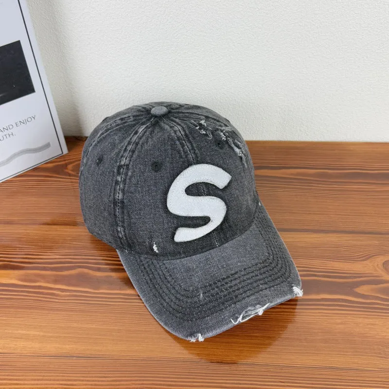 Damen Baseballkappe im Used-Look mit Grafik-Logo Skanto
