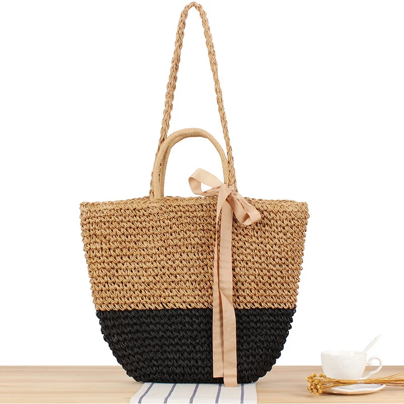 Strandtasche aus Natur-Bast mit verspieltem Design und eleganter Schleifendekoration Skanto