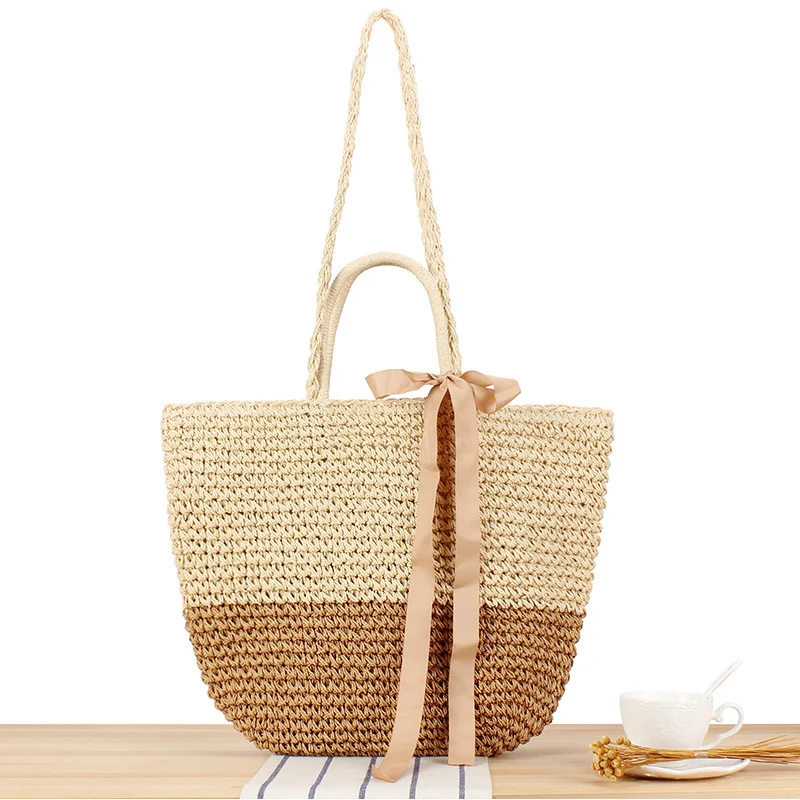 Strandtasche aus Natur-Bast mit verspieltem Design und eleganter Schleifendekoration Skanto
