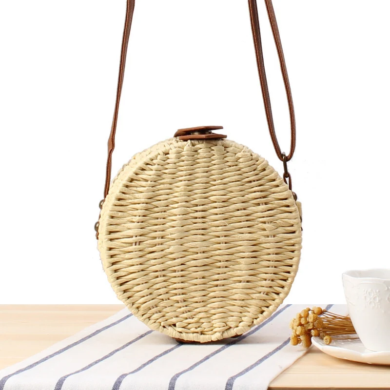 Runde gewebte Tasche mit Lederdetails Skanto