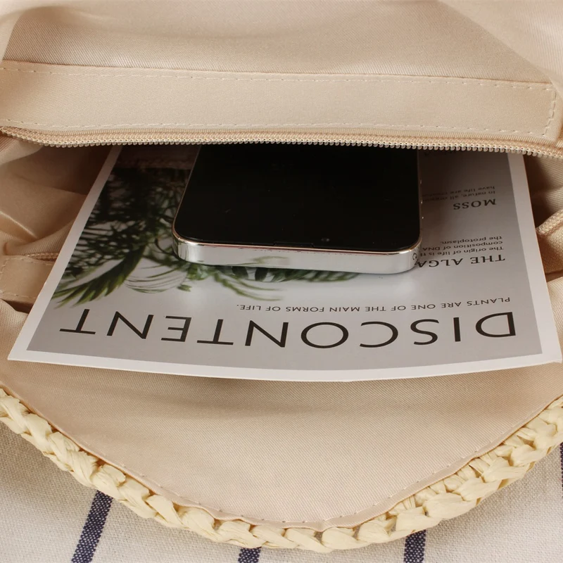 Runde Raffia-Schultertasche mit einzigartigem Klappverschluss Skanto