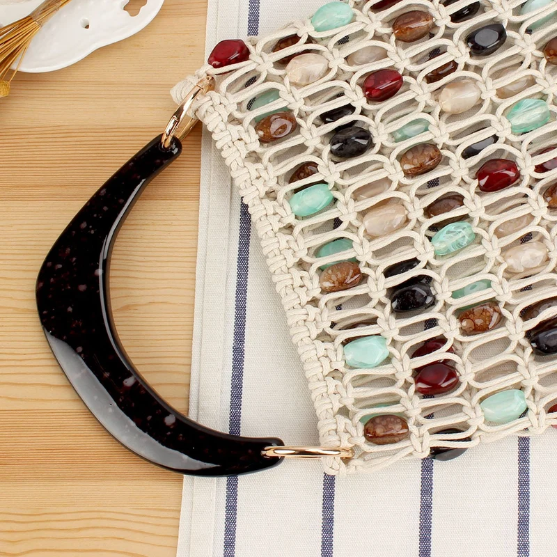 Modische Handtasche im kreativen Netzdesign mit farbigen Akzenten Skanto