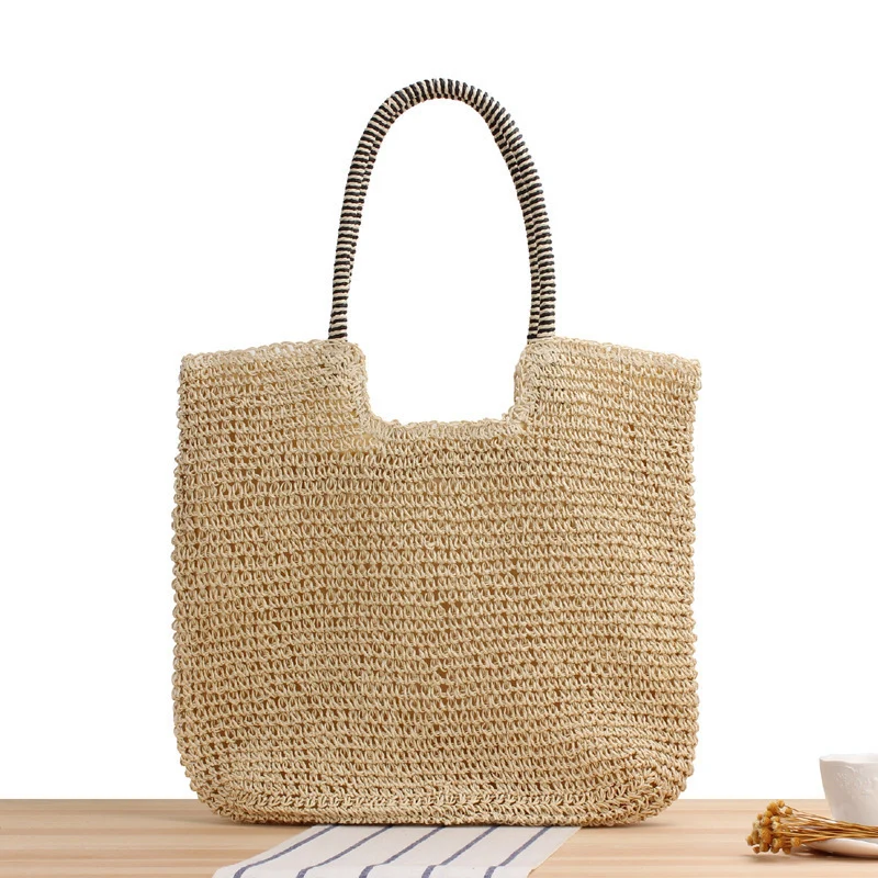 Handgefertigte Raffia-Umhängetasche mit strukturierter Oberfläche Skanto