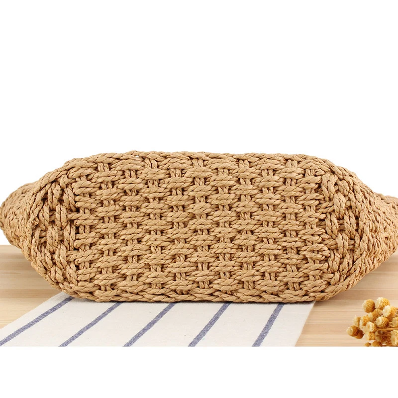 Geflochtene Strohtasche mit Lederapplikation Skanto