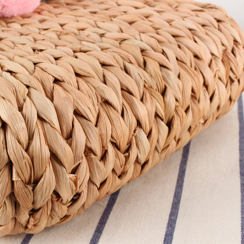 Korbtasche mit bunten Pompons und Griff Skanto