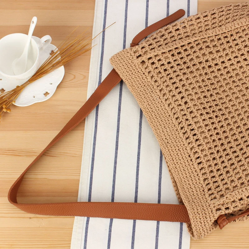 Geflochtene Umhängetasche mit breiten Ledergriffen Skanto