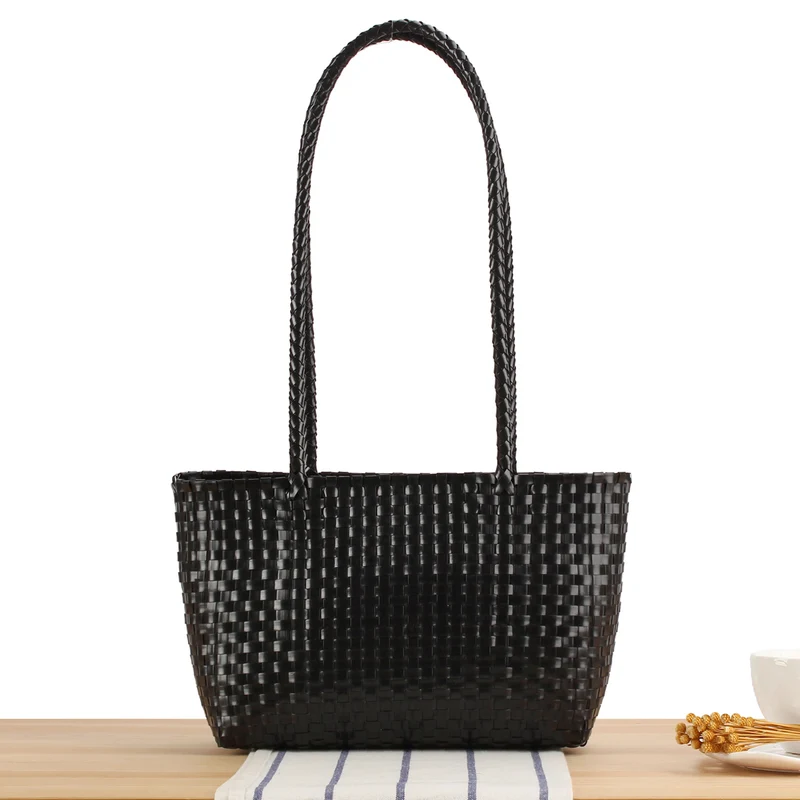 Handtasche mit Flechtdesign und langen Trägern Skanto