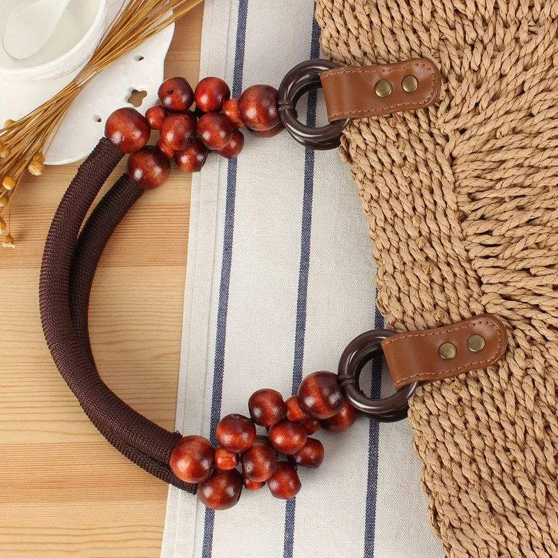 Handtasche mit dekorativen Holzperlen und Naturgeflecht Skanto