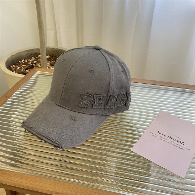 Damen Baseball Cap mit Peace-Grafik im Used-Look Skanto