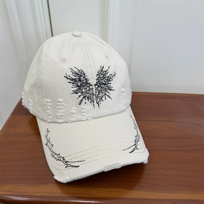 Damen Baseball Cap mit Grafik im Used-Look Skanto