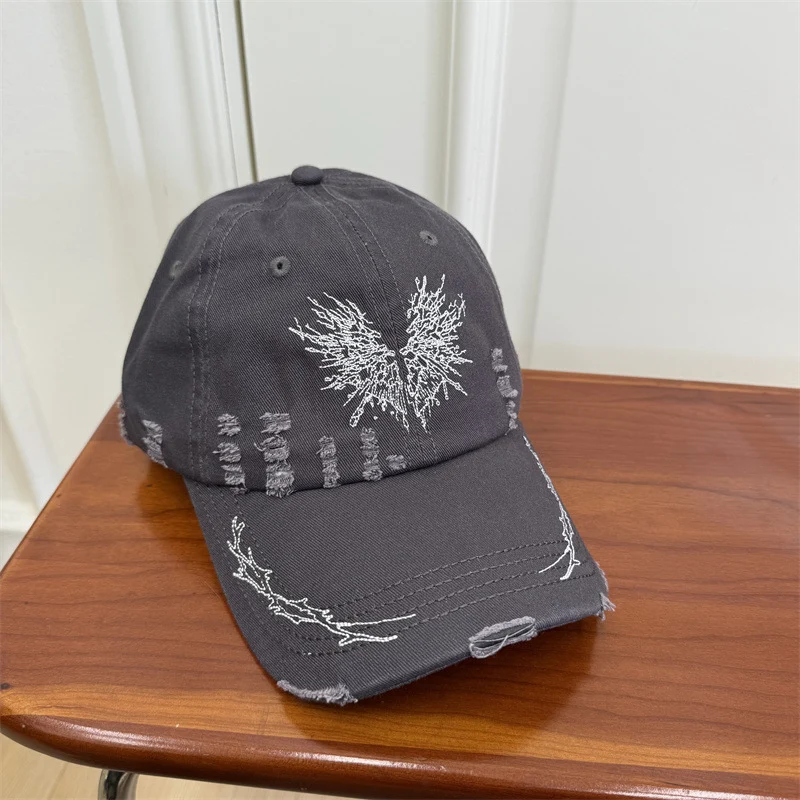 Damen Baseball Cap mit Grafik im Used-Look Skanto